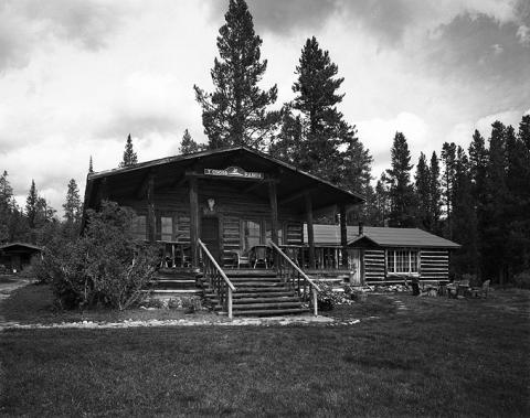 The porch and extended gable roof on the T Cross Ranch lodge are typical of the ranch's historic buildings. Wyoming SHPO photo. The porch and extended gable roof on the T Cross Ranch lodge are typical of the ranch's historic buildings. Wyoming SHPO photo.