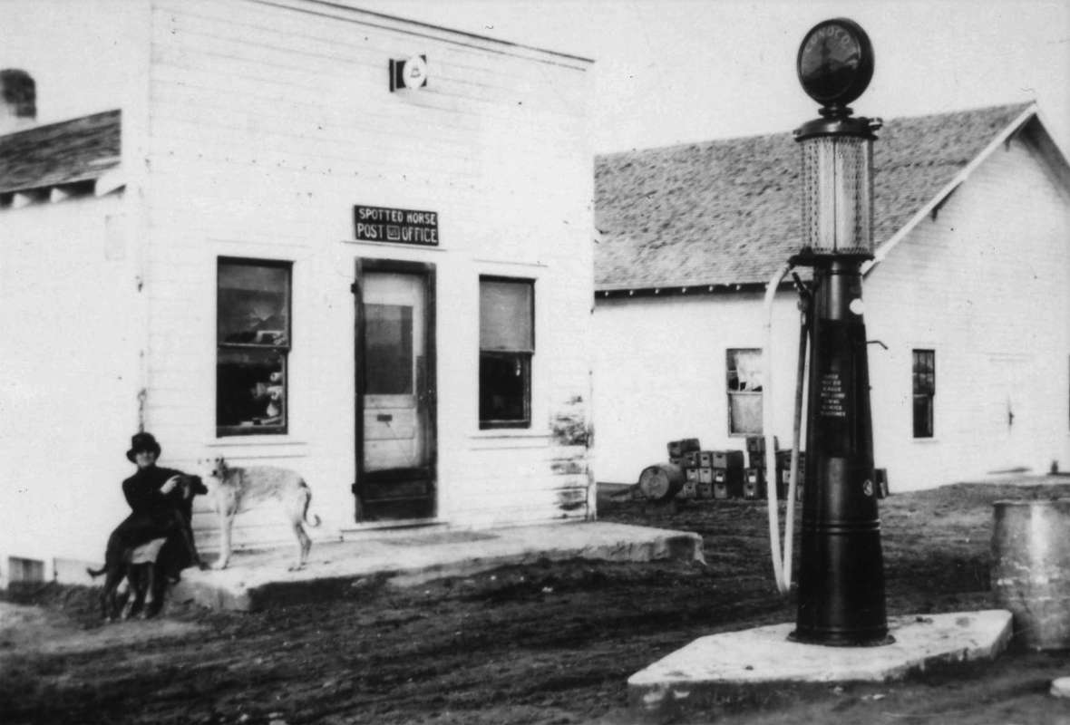 A survey conducted by the Wyoming State Highway Department rerouted the Black and Yellow trail to loop north between Gillette and Buffalo, passing through Spotted Horse (depicted here in the late 1920s). The general store and post office were burned and rebuilt, and the dance hall at right succumbed to a tornado in 1944, but today a traveler will still find a general store and the famous spotted horse. Campbell County Rockpile Museum. A survey conducted by the Wyoming State Highway Department rerouted the Black and Yellow trail to loop north between Gillette and Buffalo, passing through Spotted Horse (depicted here in the late 1920s). The general store and post office were burned and rebuilt, and the dance hall at right succumbed to a tornado in 1944, but today a traveler will still find a general store and the famous spotted horse. Campbell County Rockpile Museum.