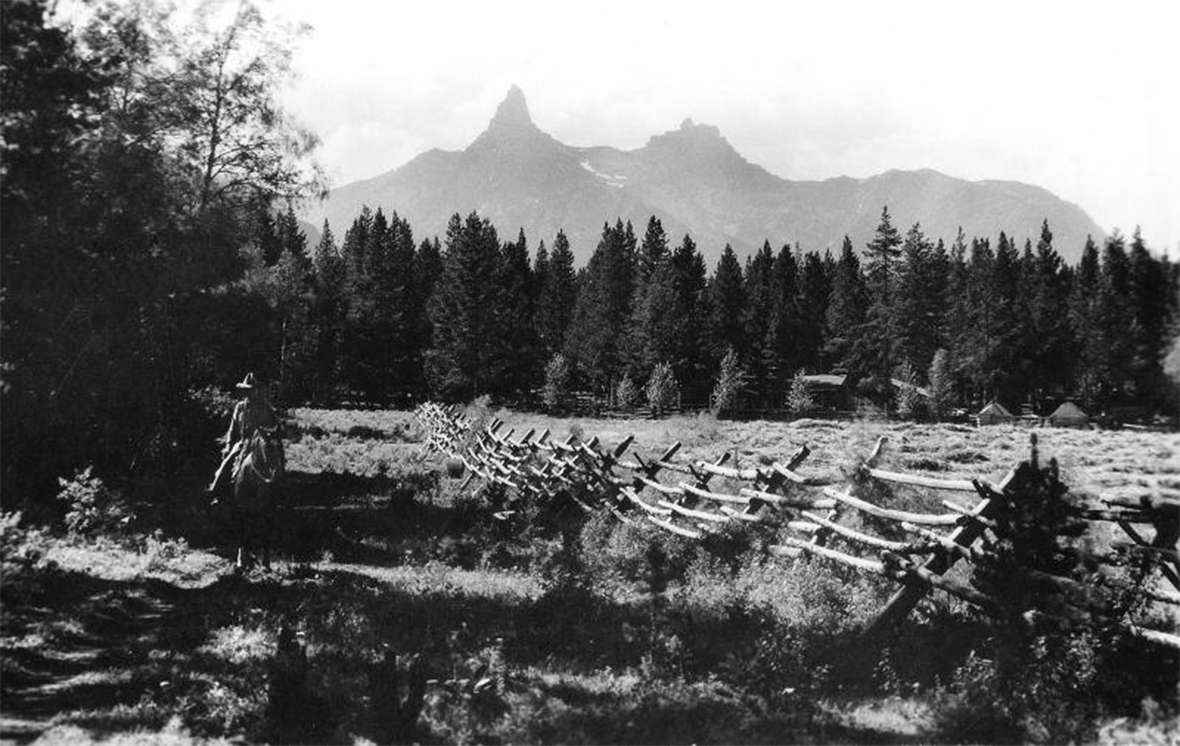 A 1930s view of Pilot Peak in the Absaroka Range northwest of Cody, from the L Bar T Ranch, where Hemingway, sometimes with his wife Pauline and their children, spent summers in the 1930s. Wyoming State Archives.