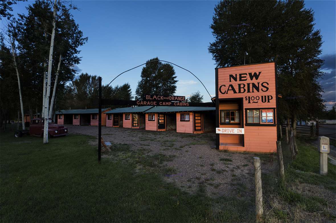 The Black and Orange tourist cabins on the old U.S. 30 outside the gate of Fort Bridger were restored in 2009, part of a growing nostalgia about the Lincoln Highway, and are now part of the state historic site. They were built about 1926; there was no indoor plumbing but guests could park their cars in the covered garage spaces. Doc Thissen photo. The Black and Orange tourist cabins on the old U.S. 30 outside the gate of Fort Bridger were restored in 2009, part of a growing nostalgia about the Lincoln Highway, and are now part of the state historic site. They were built about 1926; there was no indoor plumbing but guests could park their cars in the covered garage spaces. Doc Thissen photo.