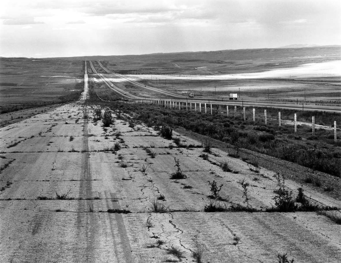 By the 1980s, when this photo was taken, grass was starting to grow through the cracks of the former U.S. 30, shown here in a stretch paralleling Interstate 80 near Creston, Wyo., and the Continental Divide. Drake Hokanson photo. By the 1980s, when this photo was taken, grass was starting to grow through the cracks of the former U.S. 30, shown here in a stretch paralleling Interstate 80 near Creston, Wyo., and the Continental Divide. Drake Hokanson photo.