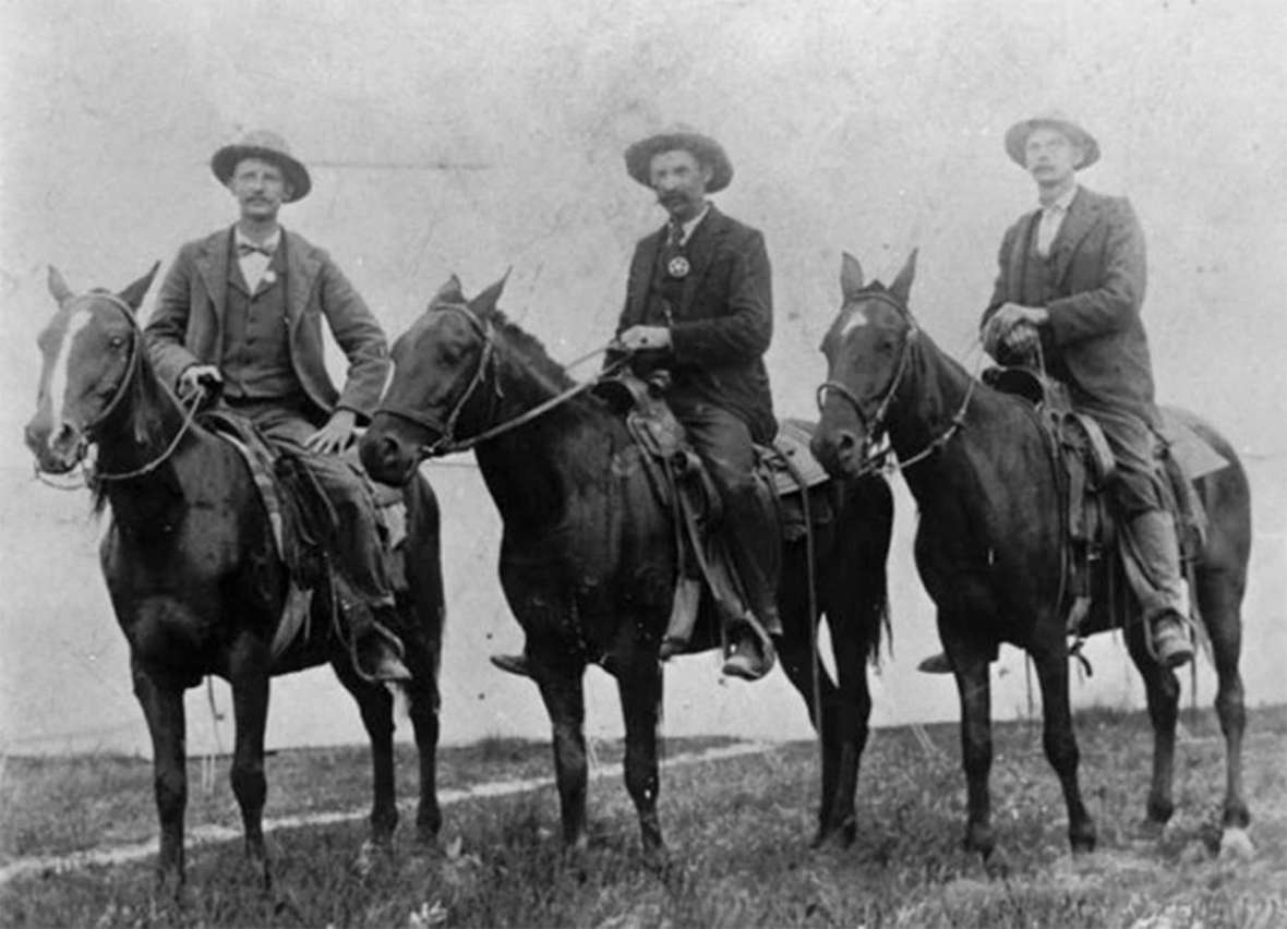 Longtime lawman Joe Davenport, above, left, and below, second from left, later found what is believed to be Bub Meeks’s rifle in Brown’s Hole, where Colorado, Wyoming and Utah meet. Davenport served as a deputy sheriff in Moffat County, Colo. and Sweetwater County, Wyo. before serving many years on the Rock Springs police force. The first photo is undated; the second from 1924. Uintah (Utah) County Library; Sweetwater County Historical Museum. Longtime lawman Joe Davenport, above, left, and below, second from left, later found what is believed to be Bub Meeks’s rifle in Brown’s Hole, where Colorado, Wyoming and Utah meet. Davenport served as a deputy sheriff in Moffat County, Colo. and Sweetwater County, Wyo. before serving many years on the Rock Springs police force. The first photo is undated; the second from 1924. Uintah (Utah) County Library; Sweetwater County Historical Museum.