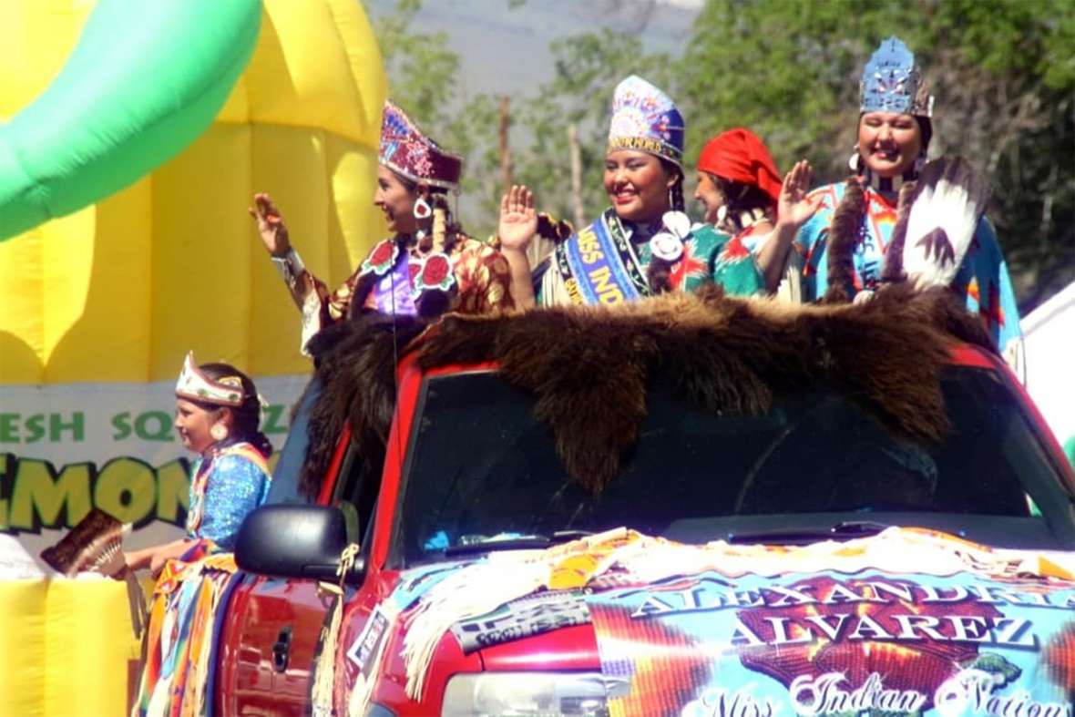 All American Indian Days and the Miss Indian America Pageant continue to inspire present generations. Left to right: Miss Native American U.S.A. Sarah Ortegon (Eastern Shoshone), Miss Indian World Taylor Thomas (Shoshone-Bannock) and Miss Indian Nations Alexandra Alvarez in a float at Eastern Shoshone Days on the Wind River Reservation in Wyoming, 2014. Gregory Nickerson/WyoFile. All American Indian Days and the Miss Indian America Pageant continue to inspire present generations. Left to right: Miss Native American U.S.A. Sarah Ortegon (Eastern Shoshone), Miss Indian World Taylor Thomas (Shoshone-Bannock) and Miss Indian Nations Alexandra Alvarez in a float at Eastern Shoshone Days on the Wind River Reservation in Wyoming, 2014. Gregory Nickerson/WyoFile.