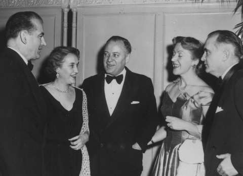 Sen. Joseph McCarthy, left, Republican of Wisconsin and his wife, Jean; Sen. Styles Bridges, center, Republican of New Hampshire and his wife, Deloris; and Sen. Herman Welker of Idaho. The three Republicans worked together to blackmail Hunt, threatening to reveal Hunt’s son’s arrest for soliciting homosexual sex if Hunt did not resign. New Hampshire Division of Archives and Records. Sen. Joseph McCarthy, left, Republican of Wisconsin and his wife, Jean; Sen. Styles Bridges, center, Republican of New Hampshire and his wife, Deloris; and Sen. Herman Welker of Idaho. The three Republicans worked together to blackmail Hunt, threatening to reveal Hunt’s son’s arrest for soliciting homosexual sex if Hunt did not resign. New Hampshire Division of Archives and Records.
