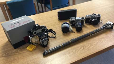 Some of Finis Mitchell's cameras in the collections of the American Heritage Center at the University of Wyoming. By 1979, the Wall Street Journal reported, Mitchell said he had taken 106,000 photographs. Lori Van Pelt photo.