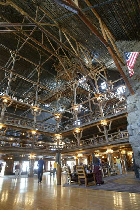 Daylight filtering down through the seven-story interior of the Old Faithful Inn recalls the light in a leafy forest. NPS photo, via Wikipedia.